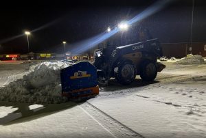 Kage Snowfire on John Deere 332C skid steer