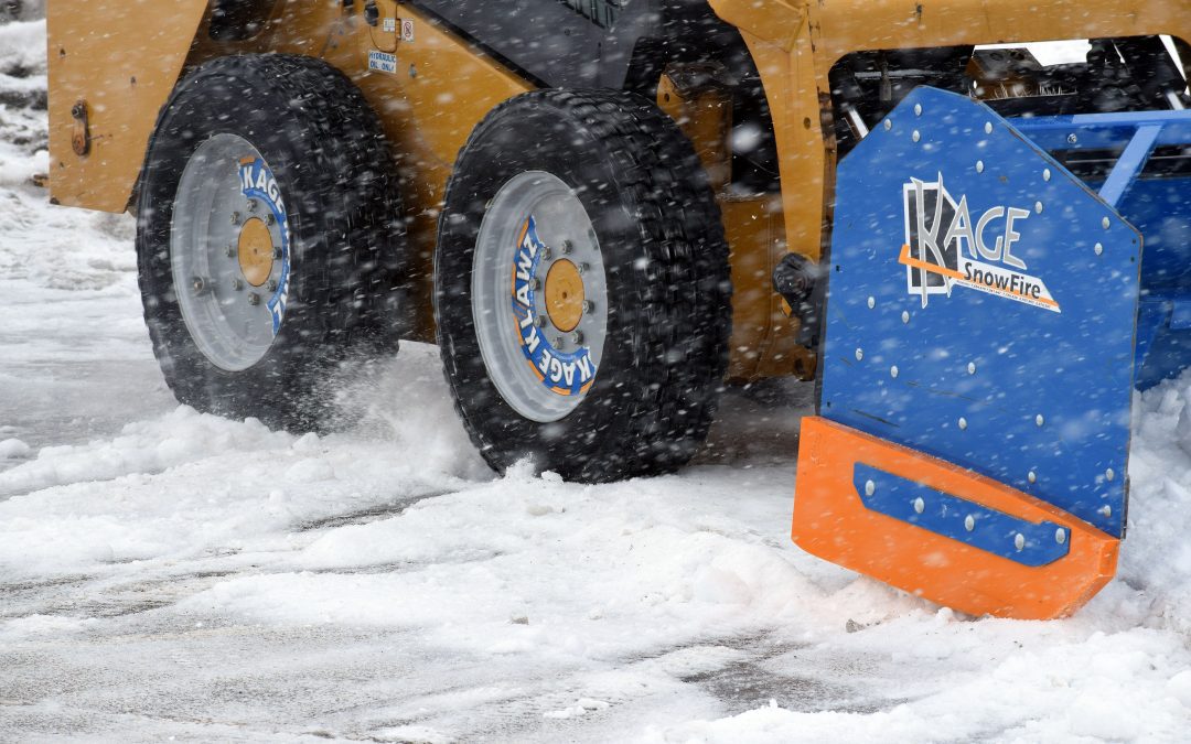 Skid Steer Snow Tires vs. Chains and Tracks for Traction