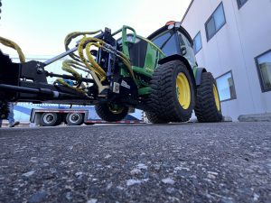 Under-Hitch 8000 tractor undercarriage connected to direct hitch pivot frame